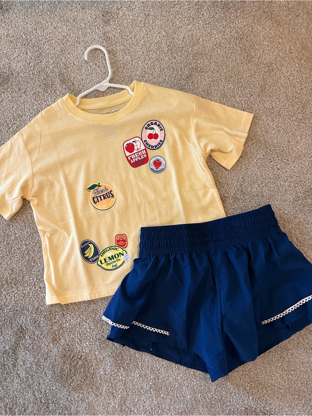 Brand new Girls Yellow Fruit Patch Tee & Navy Blue Ruffle Shorts Set